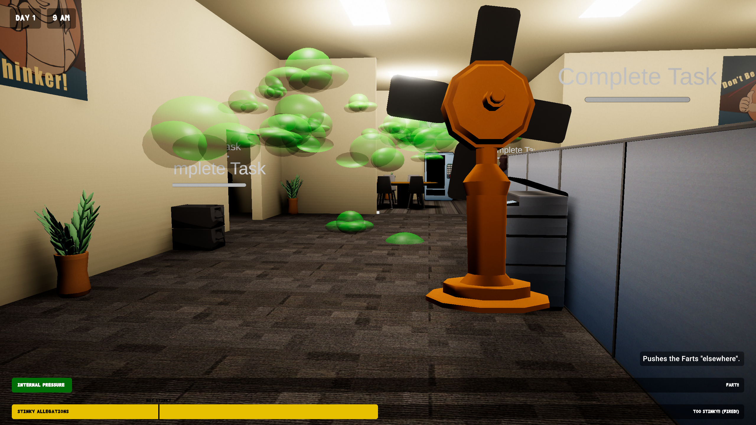 Using a fan to push green fart clouds away across the office floor